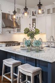 Irvin's tinware has a wide variety of kitchen lighting options. Gorgeous Kitchen With White Cabinets Glass Globe Pendants And Navy Island Farmhouselighting Kitchen Bar Lights Kitchen Remodel Farmhouse Style Kitchen