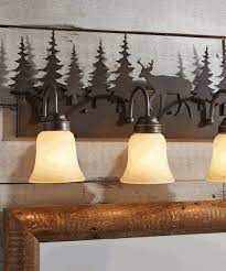 Featuring rustic light fixtures and cabin lighting from black forest decor, including pendants, steel partners lighting and shadow mountain products lighting. Rustic Vanity Light Fixtures Cabin Bathroom