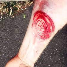 小臂割肉大众车标纹身图案 tattoos