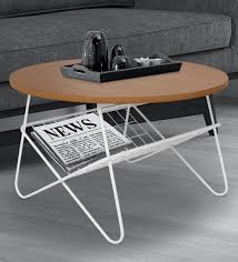 Round wooden coffee tables are ideal for pairing with a sectional sofa or a couch and chairs. Buy Regina Coffee Table In Natural Wood Colour By Script Online Round Coffee Tables Tables Furniture Pepperfry Product