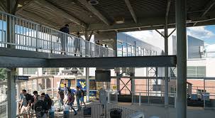 There right with you cheering on all of the mountaineers greats there's a reason we're still here, 15 presidents, 14 wvu head football coaches, and 85 years later. Evansdale Crossing Strada A Cross Disciplinary Design Firm