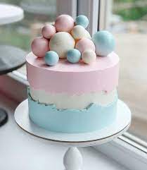 a boy or a girl baby shower cake decorated with white pink and blue baby blue baby shower cakes girl shower cakes yummy cakes