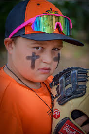 What are good tips and lens recommendations for sports photography at ball  parks using a Nikon D3200?