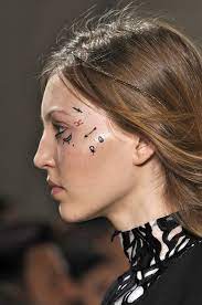 Daring To Dream Again What Face Tattoos And Septum Rings On The Runway Mean For You Gallery Style Com Beauty Hair Makeup Runway Makeup Beauty