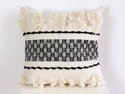 A black background gives this pillow a dramatic touch while Decorative Boho Pillow Textured Woven Cotton Moroccan Etsy Boho Pillows Pillow Texture Linen Guest Towels