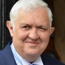 The man who went from hospital porter to one of the most influential  figures in Swansea's NHS has died