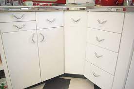 Maybe you would like to learn more about one of these? Our 50s Kitchen Renovation Cabinet Restoration Natalie Curtiss Illustration