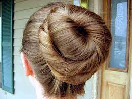 Mass Of Blonde Hair Coiled Into A Huge Bun Long Hair Styles Bun Hairstyles For Long Hair Bun Hairstyles