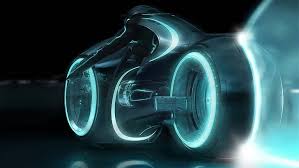 Three friends discover a mysterious machine that takes pictures 24 hours into the future and conspire to use it for personal gain. Hd Wallpaper Time Lapse Tron Movie Still Light Cycle Tron Legacy Motion Wallpaper Flare