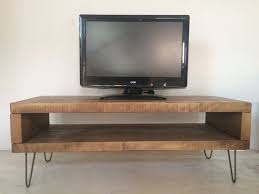 With at least four hairpin legs, wood glue, screw, and nails, you'll have a unique tv stand that can fit in small spaces like the wall corners. Rustic Industrial Plank Tv Unit Stand With Metal Hairpin Legs Chunky Wood Vintage Retro Raw Wood Furniture Solid Wood Coffee Table Raw Furniture