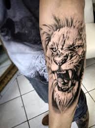 Watercolor lion face tattoo designs on thigh for boys and girls. 40 Lion Forearm Tattoos For Men Manly Ink Ideas