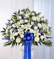 Flower arrangements brandishing hues of red and white are popular options when it comes to choosing funeral flowers for grandad, as these hues are associated with caring, loving, strong and fun characteristics. Funeral Basket Blue And White Arrangement In Lexington Nc Rae S North Point Florist Inc