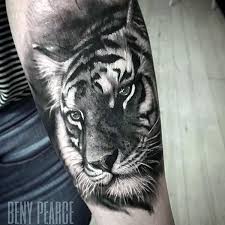 Download this premium vector about tattoo and t shirt design black and white hand drawn tiger head engraving ornament, and discover more than 15 million professional graphic resources on freepik Black Tiger Head Tattoo Novocom Top