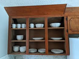 New cabinet doors & accessories. My Wife Wants To Leave These Cabinet Doors Off So How Do I Refinish Refresh The Wood Inside My 35 Year Old Oak Cabinets I Ve Seen Open Faced Cabinets Painted White Inside And