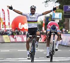 The rainbow jersey is the distinctive jersey worn by the reigning world champion in a cycling discipline, since 1927. Julian Alaphilippe Bike Champion Sports
