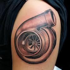 Check out the images, designs and collections. Nice Grey Turbo Charger Tattoo On Left Shoulder