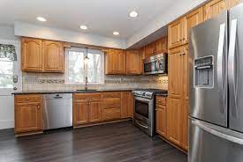 If you are looking for a light gray to pair with your honey oak trim, then stingray 1529 is an excellent option. Gray Laminate Flooring With Oak Cabinets Laminate Flooring