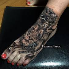 Lion king and queen crowned feet tattoo. Sullentv On Instagram Every Queen Needs Her King Beautiful Lion Foot Tattoo By Teneile Napoli Of Garage Ink Foot Tattoos Tattoos Foot Tattoos For Women