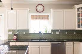 It's a tie for my favorite white kitchen cabinet paint color. Painted Kitchen Cabinet Ideas And Kitchen Makeover Reveal The Polka Dot Chair