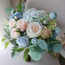 Customize this bouquet to suit your color scheme or order it just as shown to be part of your special day! Dusty Blue Wedding Bridal Bouquet Rustic Classic Boho Flower Etsy In 2021 Bridal Bouquet Blue Peach Wedding Flowers Blue Wedding Flowers
