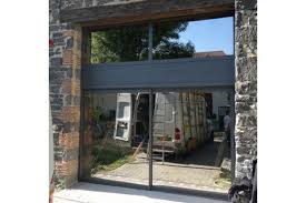 Porte de garage vitrée coulissante. Fabricant Baie Vitree Riom Chamalieres Gerzat Puy Dome Vichy Allier
