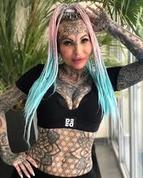 Mum covers her body in tattoos after ditching husband who hated ink