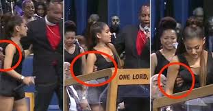 Image result for Bishop Ellis apologises to Ariana Grande for onstage 'touching' and 'joke'