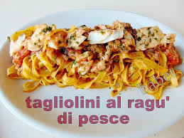Basket of il fornaio fresh baked bread; Tagliolini Al Ragu Di Pesce 4 Matti In Cucina 1