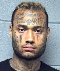 Face tats help Chicago police identify train robber (again)