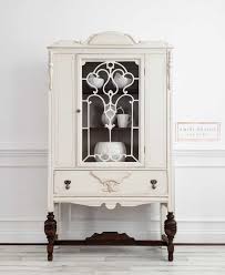 Lovely antiqued green offers a blush of cool color, embellished with bronze hardware on its doors and drawers. Antique China Hutch Makeover Step By Step