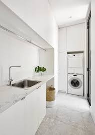 Hidden laundry in the mudroom. 75 Beautiful Modern L Shaped Laundry Room Pictures Ideas July 2021 Houzz