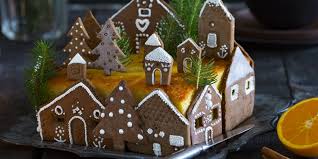 Je vous divulgue tous mes secrets et tours de mains pour réussir à coup sûr, votre bûche faite maison. Un Gateau De Noel Avec Des Maisons En Speculoos Marie Claire