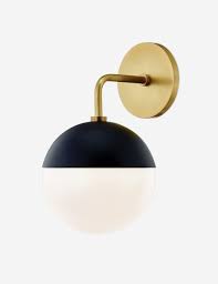 It's made from metal and features a circular backplate with a horizontal capture the old with the new as stunning clear glass globe shades create a gorgeous glow that will evoke memories of the silhouettes and. Lilu Sconce In 2021 Wall Sconces Brass Bathroom Sconce Black Sconces