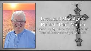 Reverend Monsignor Robert “Dan” Malain