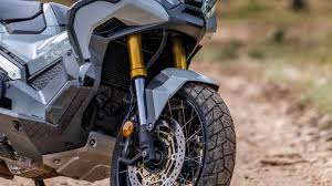 The honda selectable torque control level has much finer control over 3 levels, also adjusts to suit. Honda X Adv Honda Motorrader Adventure Off Road Touring