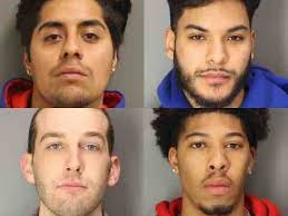 Beacon graffiti: Four men charged