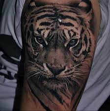 This elegant tiger head tattoo design done in the lines has a feminine and delicate look. 121 Best Tiger Tattoo Designs Representing The Glorious Beasts