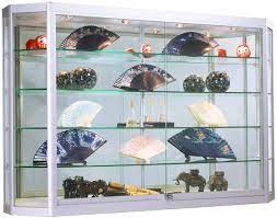 Make a good choice while selecting a wall tv showcase design. Wall Showcase Cabinet With Led Lights Angled Front Design