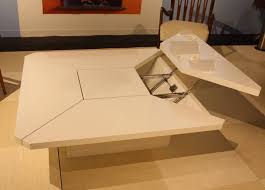 Here is a very simple coffee table that here is a very simple coffee table that also works well as a laptop desk. Multifunctional Coffee Table Thebestwoodfurniture Com