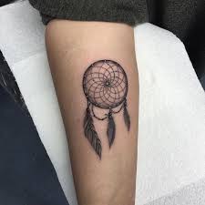 The color of the purple and green really make this dreamcatcher stand out from the rest. Dreamcatcher Tattoo Meanings Dream Catcher Designs August 2021