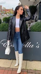 Get a little grunge as you throw on a grey biker jacket on top of a cute white crop and high waisted boyfriend jeans. What To Wear With A Leather Jacket The Complete Guide For Women
