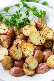 Crispy Herb Roasted Potatoes Recipe Herb Roasted Potatoes Grilled Side Dishes Red Potato Recipes