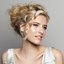 The updo style for curly hair doesn't have to be the most complicated and difficult style you try. Untamed Tresses Naturally Curly Wedding Hairstyles