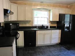 kitchen white cabinets black appliances