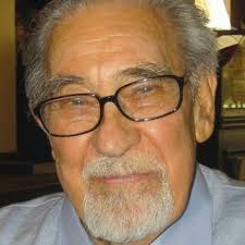 Professor W.M.S. Russell cuts the tape to officially open Russell &...