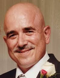 Obituary for Charles A. "Chuck" Russell