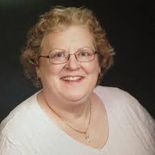 When will Livonia use new garbage trucks with 60 or 95 gallon containers?