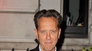 Actor Richard E Grant treated in hospital after being hit