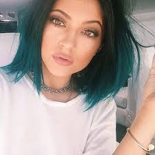 Kylie jenner arrives to the bellami hair launch party in west hollywood with bright blue hair showing off her cleavage. Now Trending In The Hair World Mermaid Blue Hair Kylie Jenner Hair Jenner Hair Hair Styles