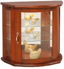 Features four shelves, serpentine shape and leather loops for hanging. Hanging Wall Curio Cabinet Free Shipping